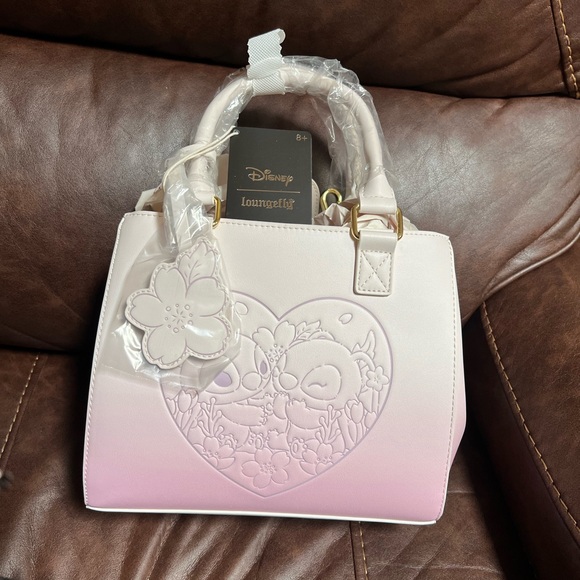 Loungefly Handbags - Loungefly Stitch and Angel Pink Ombre crossbody with Charm